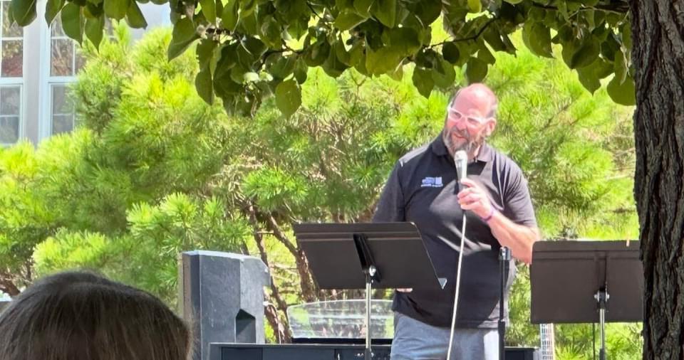 Campus pastor speaking at event